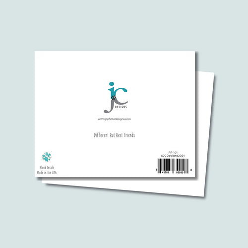 back of Different But Best Friends greeting card showing JC Pet Designs logo and unique tagline message that says "Different But Best Friends", in bottom left corner is Oz's paw print in teal color and text below paw print says "blank inside, made in the USA", and in the bottom right corner is the sku and barcode