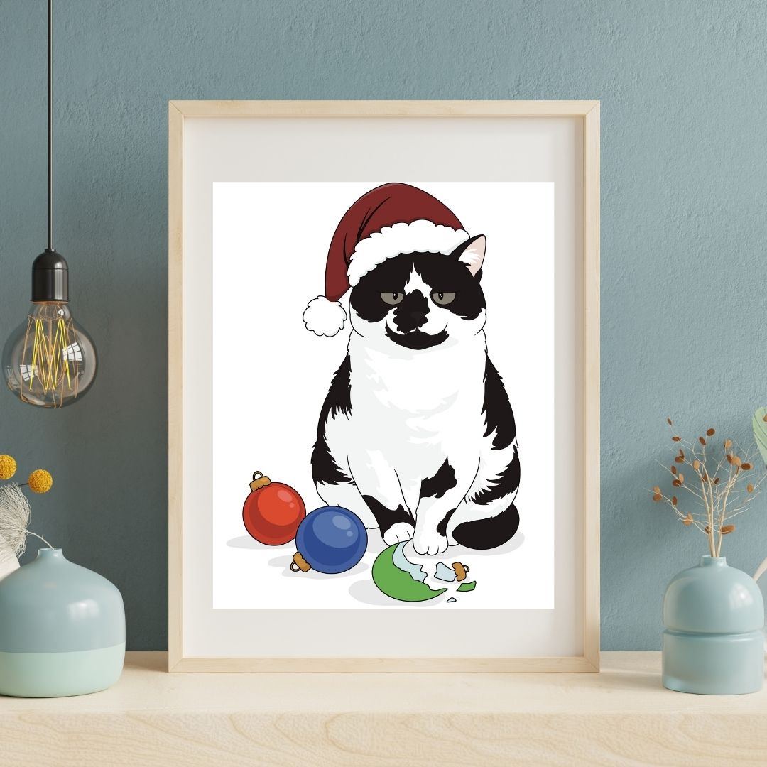 Framed custom hand-drawn artwork of a black and white cat wearing a Santa hat on a blue wall.