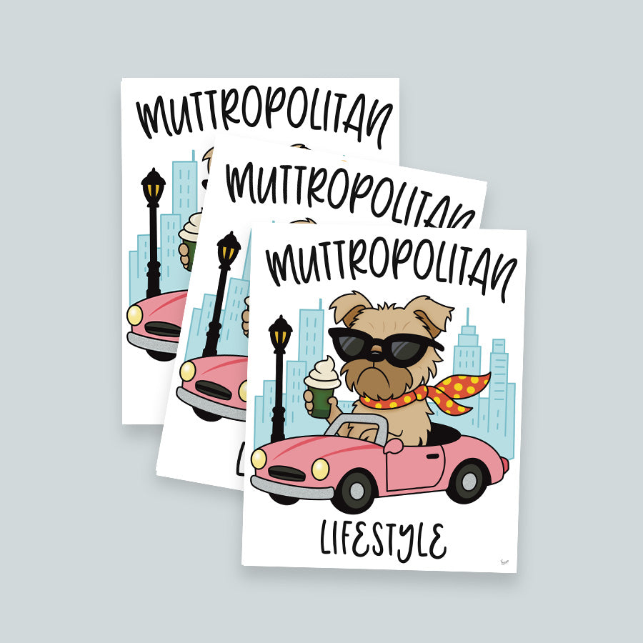 Set of three art prints stacked and on top is Muttropolitan Lifestyle art print featuring a tan Brussels Griffon dog wearing black sunglasses and a red and yellow polk-a-dot scarf blowing in the wind, holding a puppucino in a green coffee cup and driving a pink convertible car with city high rise buildings and black light post in the background, the words muttropolitan are rounded on top the image and lifestyle is on the bottom, overall image has a white background