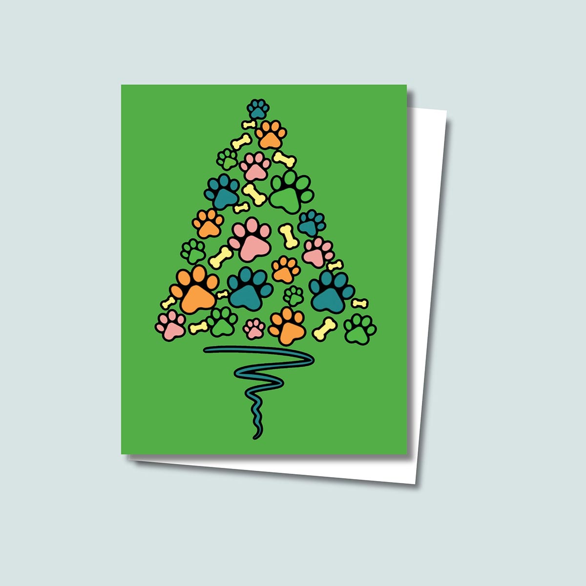 Paw Print Christmas Tree card featuring blue orange pink green paws and yellow bones shaped like a Christmas Tree with a blue wavy line as the tree trunk on a green background