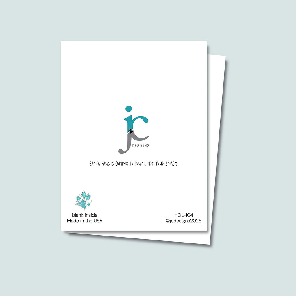 back of Santa Paws Christmas card showing JC Pet Designs logo and unique tagline "Santa Paws is Coming to Town...Hide Your Snacks", in the bottom left corner is Oz's paw print in teal and text reading "blank inside, made in the USA", the sku and copyright @jcpetdesigns2025 are in the bottom right corner of the white card