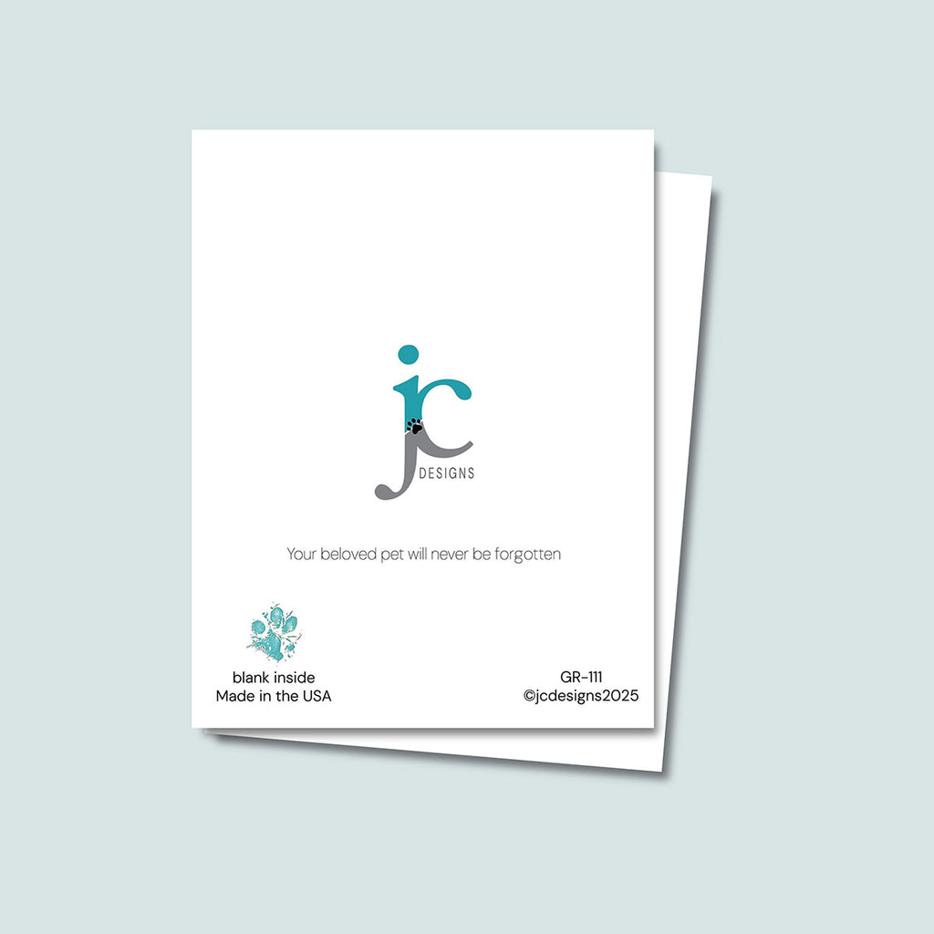 back of Whiskers in Heaven card showing JC Pet Designs logo and unique tagline that reads "Your beloved pet will never be forgotten", in the bottom left corner is Oz's paw print in teal and text that reads "blank inside, made in the USA", the sku and copyright @jcpetdesigns2025 are on the bottom right corner