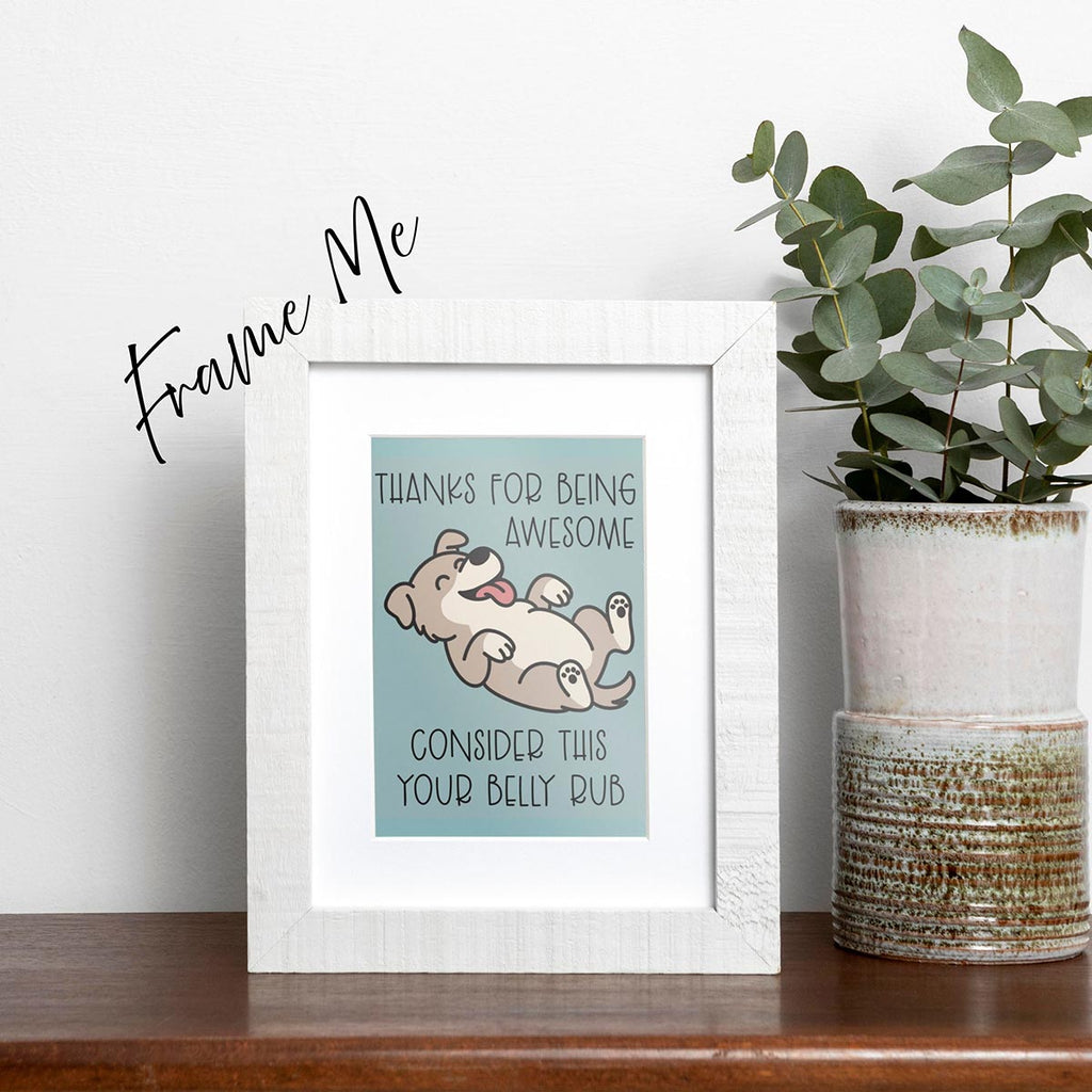 framed Thanks for Being Awesome greeting card featuring a happy brown dog with a light tan belly lying on its back with its tongue sticking out, text on the card reads "Thanks for Being Awesome, Consider This Your Belly Rub", card has a muted teal background, frame not included in purchase