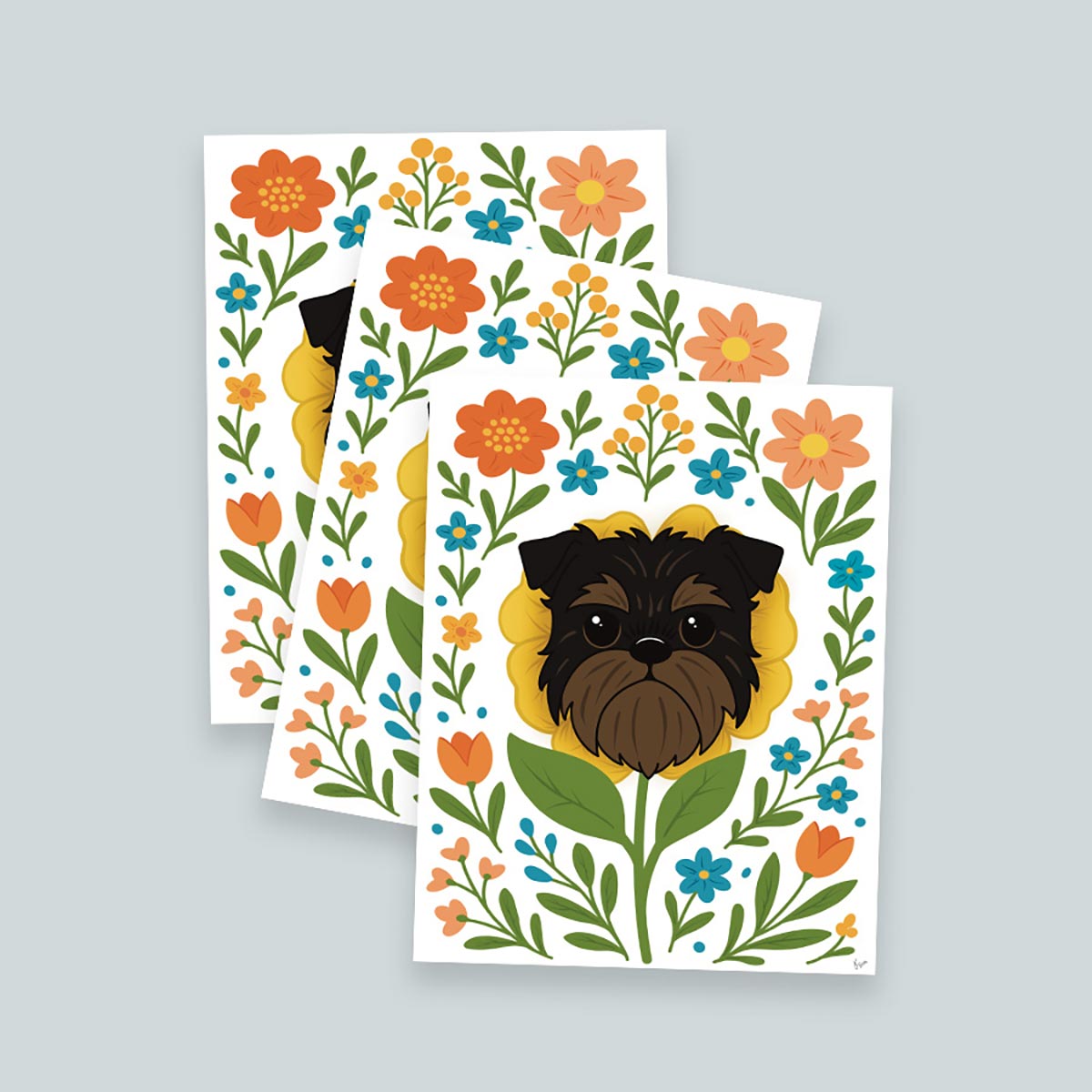 stack of 3 Brussels Griffon flower art print featuring a black and tan Griffon dog's face framed by a yellow flower surrounded by orange and teal flowers and green leaves and stems on a white background