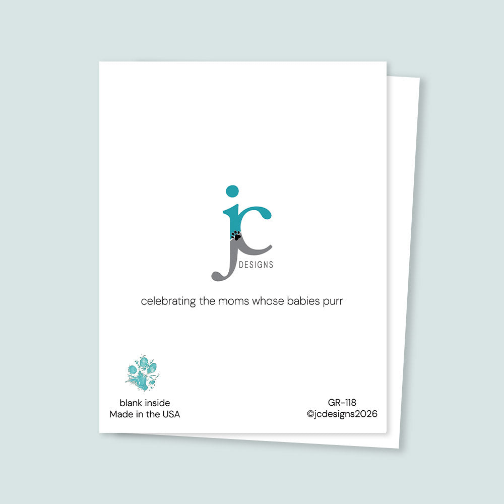 Back of greeting card featuring JC Designs logo with paw print, the phrase “celebrating the moms whose babies purr,” and text noting the card is blank inside and made in the USA