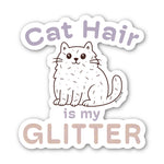 Sticker of a fluffy white cartoon cat covered in scattered strands of cat hair. Above the cat, the phrase 'Cat Hair' is written in soft purple text, with 'is my' is smaller matching text below the cat. The word 'GLITTER' is prominently displayed at the bottom in large, sparkling textured letters. The design is outlined in white.