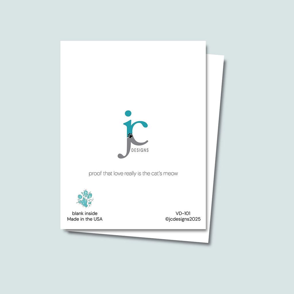 back of Feline Fine Valentine's Day card showing JC Pet Designs logo and unique tagline that reads "proof that love really is the cat's meow", in the lower left corner is Oz's paw print in teal and text that reads "blank inside, made in the USA", the sku and copyright @jcpetdesigns2025 are on the lower right corner