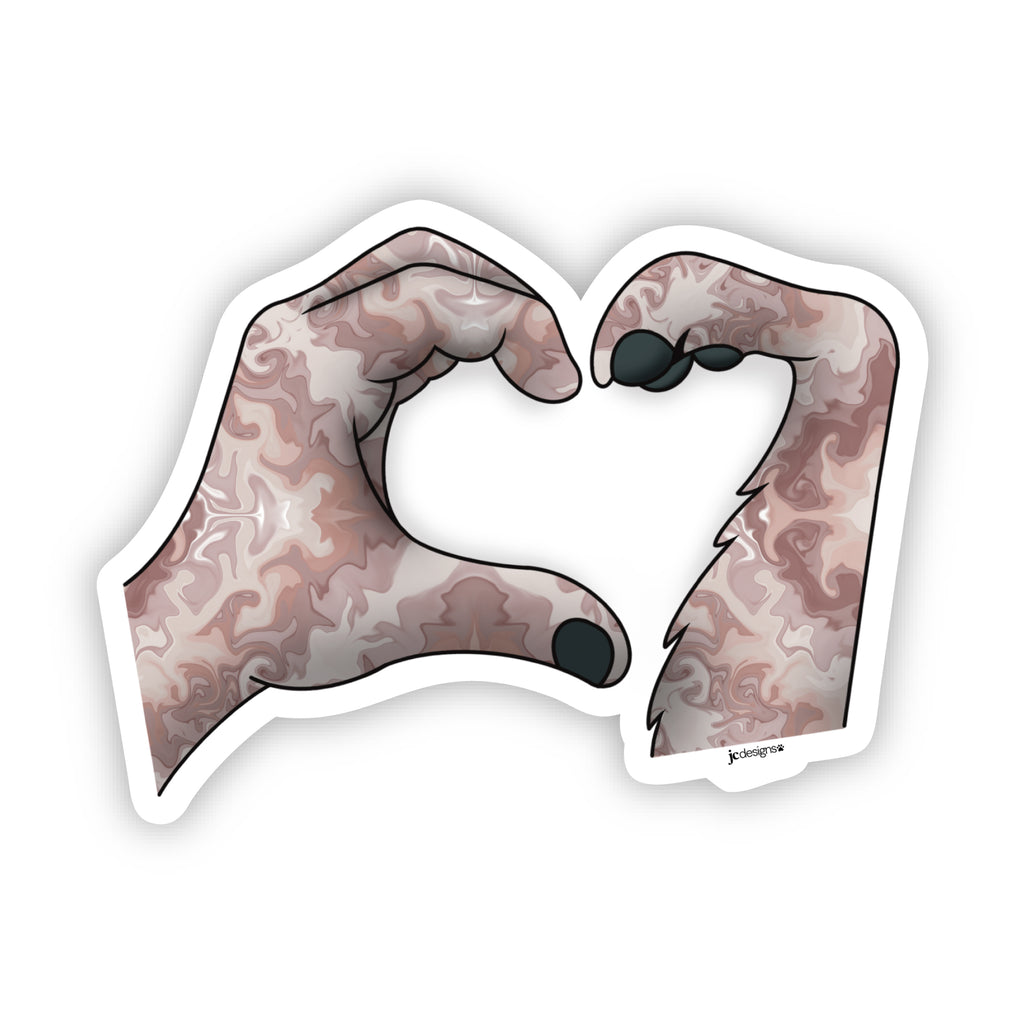 Sticker featuring hand and dog paw print forming a heart together in tan marble textured pattern.