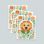 stack of 3 Labrador flower art prints featuring a yellow lab dog's face surrounded by orange teal and yellow flowers and green stems leaves on a white background
