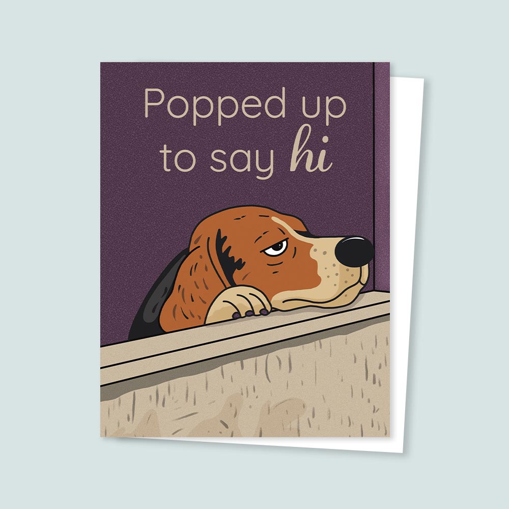 Illustrated greeting card of a dog popping up over a wall with the text “Popped up to say hi”